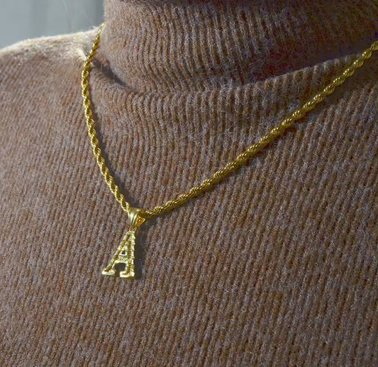 Gold letter pendants